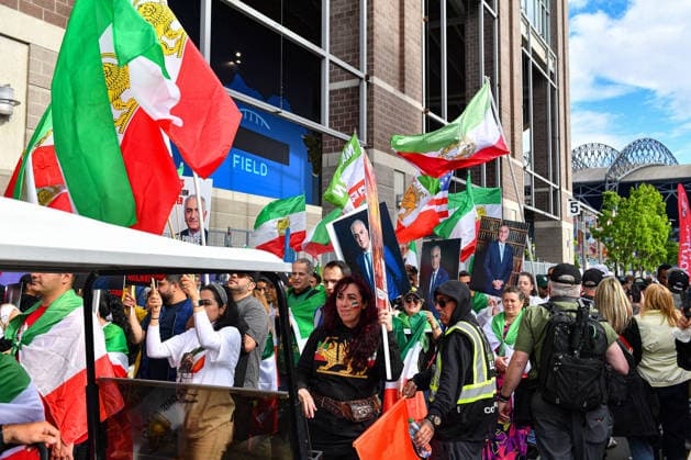 June 26, 2026: Iranian anti-regime protesters march outside Seattle Stadium before the FIFA World Cup, WM, Weltmeisterschaft, Fussball match between Egypt and Iran in Seattle, WA. CSM FIFA World Cup 2026: JUN 26 Egypt Vs Iran  - ZUMAc04_ 20260626_zma_c04_277 Copyright: xStevexFaberx