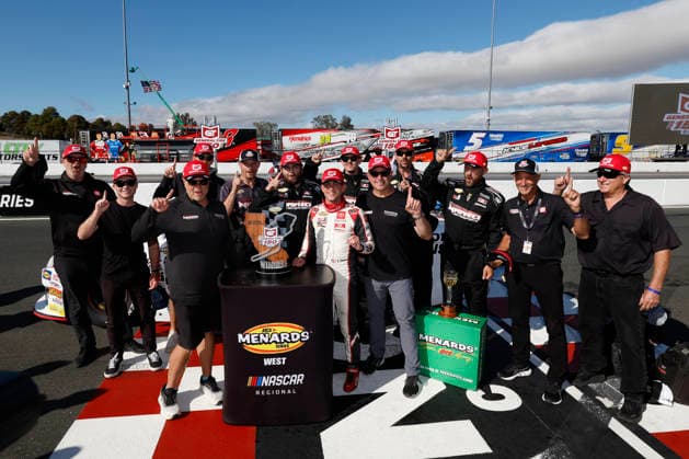 SONOMA, CA - JUNE 26: Sam Corry* ( 25 Bruce Toyota) celebrates with the trophy and his team after winning the General Tire 150 ARCA Menards Series West race on June 26, 2026, at Sonoma Raceway in Sonoma, CA. (Photo by Jeff Speer Sonoma Raceway Icon Sportswire) AUTO: JUN 26 ARCA Menards Series West General Tire 150 EDITORIAL USE ONLY Icon2606265964