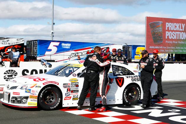 SONOMA, CA - JUNE 26: Sam Corry* ( 25 Bruce Toyota) celebrates with a crew member after winning the General Tire 150 ARCA Menards Series West race on June 26, 2026, at Sonoma Raceway in Sonoma, CA. (Photo by Jeff Speer Sonoma Raceway Icon Sportswire) AUTO: JUN 26 ARCA Menards Series West General Tire 150 EDITORIAL USE ONLY Icon2606265554