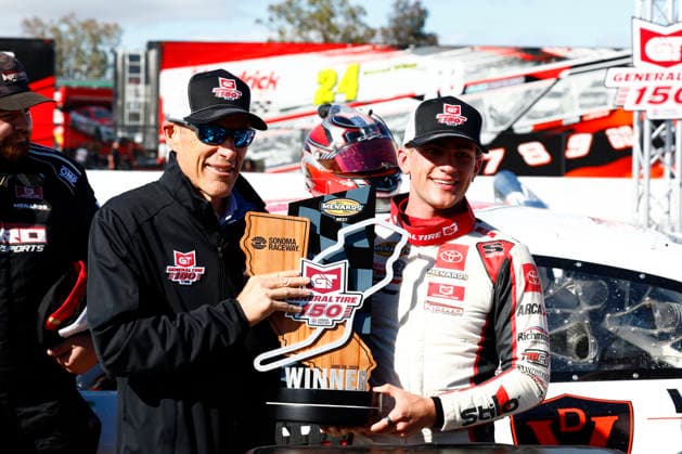 SONOMA, CA - JUNE 26: Sam Corry* ( 25 Bruce Toyota) poses with the winners trophy and Sonoma Executive Vice President and General Manager Brian Flynn, left, after winning the General Tire 150 ARCA Menards Series West race on June 26, 2026, at Sonoma Raceway in Sonoma, CA. (Photo by Jeff Speer Sonoma Raceway Icon Sportswire) AUTO: JUN 26 ARCA Menards Series West General Tire 150 EDITORIAL USE ONLY Icon2606265766