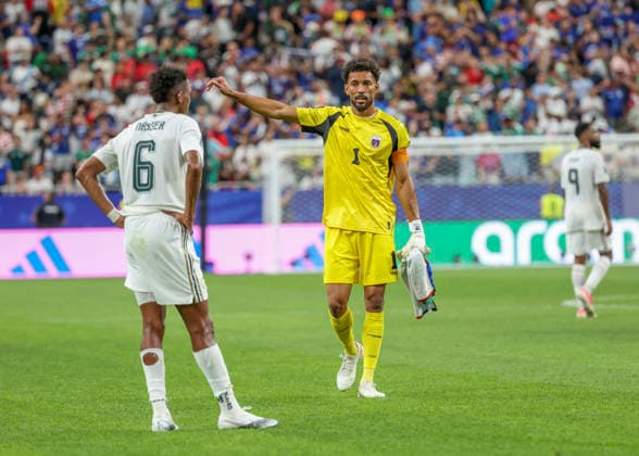HOUSTON, TX - JUNE 26: Nasser al-Dawsari 6 of Saudi Arabia watches as Vozinha 1 of Cabo Verde waves to fans in celebration of the team™s advancing to the knockout stage following the 0-0 draw during the FIFA World Cup, WM, Weltmeisterschaft, Fussball 2026 Group H match between Cabo Verde and Saudi Arabia on June 26, 2026 at Houston Stadium in Houston, Texas. (Photo by Leslie Plaza Johnson Icon Sportswire) SOCCER: JUN 26 FIFA World Cup 26 Group H - Cabo Verde vs Saudi Arabia EDITORIAL USE ONLY Icon260626033