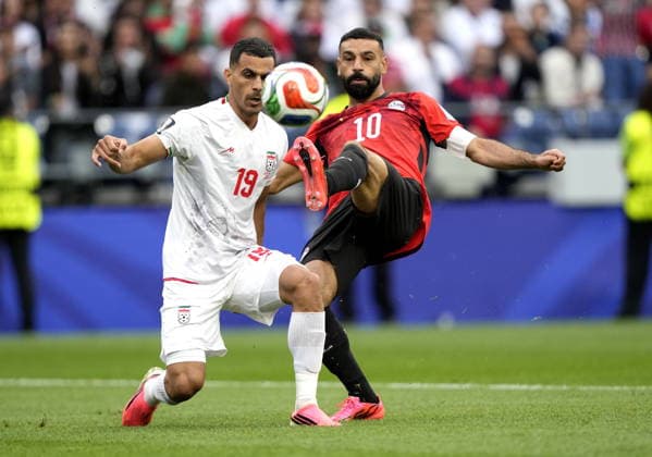FIFA World Cup, WM, Weltmeisterschaft, Fussball 2026 - Group G - Egypt vs Iran Mohamed Salah (R) of Egypt and Ali Nemati of Iran in action during the FIFA World Cup 2026 group stage match Egypt against Iran, in Seattle, USA, 26 June 2026. SEATTLE United States  Copyright: xSTEPHENxBRASHEARx