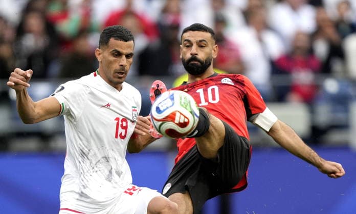 FIFA World Cup, WM, Weltmeisterschaft, Fussball 2026 - Group G - Egypt vs Iran Mohamed Salah (R) of Egypt and Ali Nemati of Iran in action during the FIFA World Cup 2026 group stage match Egypt against Iran, in Seattle, USA, 26 June 2026. SEATTLE United States  Copyright: xSTEPHENxBRASHEARx