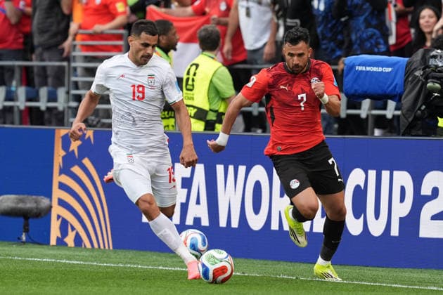 Mahmoud Trezeguet (R) of Egypt vies for the ball with Ali Nemati of Iran during a Group G match at the 2026 FIFA World Cup, WM, Weltmeisterschaft, Fussball between Egypt and Iran at Lumen Field in Seattle, United States, 26 June 2026. FIFA World Cup 2026 - Group G - Egypt vs Iran !ACHTUNG: NUR REDAKTIONELLE NUTZUNG!  Copyright: xOmarxAlonsox AME5054 20260627-55020724950_1