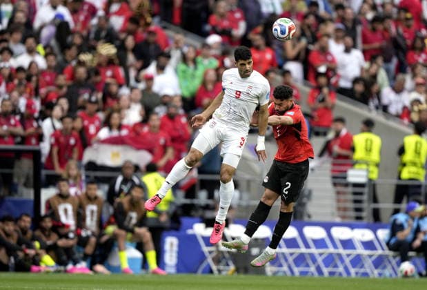 FIFA World Cup, WM, Weltmeisterschaft, Fussball 2026 - Group G - Egypt vs Iran Yasser Ibrahim (R) of Egypt and Mehdi Taremi of Iran in action during the FIFA World Cup 2026 group stage match Egypt against Iran, in Seattle, USA, 26 June 2026. SEATTLE United States  Copyright: xSTEPHENxBRASHEARx