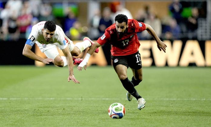 FIFA World Cup, WM, Weltmeisterschaft, Fussball 2026 - Group G - Egypt vs Iran Mohanad Lasheen (R) of Egypt and Mehdi Taremi of Iran in action during the FIFA World Cup 2026 group stage match Egypt against Iran, in Seattle, USA, 26 June 2026. SEATTLE United States  Copyright: xSTEPHENxBRASHEARx