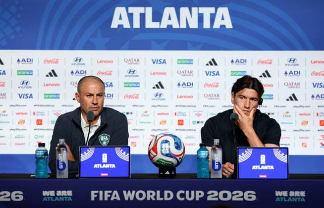 (260627) -- ATLANTA, June 27, 2026 -- Fabio Cannavaro (L), head coach of Uzbekistan, and player Eldor Shomurodov attend a press conference, PK, Pressekonferenz at the 2026 FIFA World Cup, WM, Weltmeisterschaft, Fussball in Atlanta, the United States, June 26, 2026. ) (SP)U.S.-ATLANTA-FOOTBALL-FIFA WORLD CUP-PRESS CONFERENCE-UZBEKISTAN WangxKaiyan 