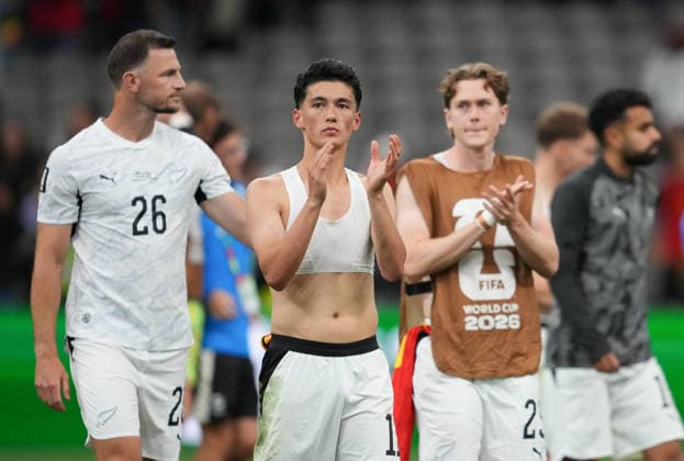 (260627) -- VANCOUVER, June 27, 2026 -- Elijah Just (2nd L) of New Zealand greets the audience after the group G match between New Zealand and Belgium at the 2026 FIFA World Cup, WM, Weltmeisterschaft, Fussball at BC Place Vancouver in Vancouver, Canada, June 26, 2026. ) (SP)CANADA-VANCOUVER-FOOTBALL-FIFA WORLD CUP-GROUP G-NZL VS BEL MengxYongmin 