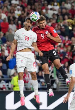 (260627) -- SEATTLE, June 27, 2026 -- Hamza Abdelkarim (R) of Egypt and Ali Nemati of Iran fight for a header during the group G match between Egypt and Iran at the 2026 FIFA World Cup, WM, Weltmeisterschaft, Fussball at Seattle Stadium in Seattle, the United States, June 26, 2026. ) (SP)U.S.-SEATTLE-FOOTBALL-FIFA WORLD CUP-GROUP G-EGY VS IRN PengxZiyang 
