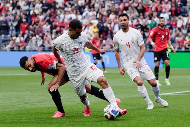 (260627) -- SEATTLE, June 27, 2026 -- Ali Nemati (2nd L) of Iran competes during the group G match between Egypt and Iran at the 2026 FIFA World Cup, WM, Weltmeisterschaft, Fussball at Seattle Stadium in Seattle, the United States, June 26, 2026. (Photo by Xinhua) (SP)U.S.-SEATTLE-FOOTBALL-FIFA WORLD CUP-GROUP G-EGY VS IRN ArthurxDong 