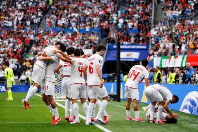 SEATTLE, WA - JUNE 26: Players from IR Iran celebrate a goal by defender Ramin Rezaeian 23 during the FIFA World Cup, WM, Weltmeisterschaft, Fussball 2026 Group G match between Egypt and IR Iran on June 26, 2026 at Seattle Stadium in Seattle, Washington. (Photo by Henry Rodenburg Icon Sportswire) SOCCER: JUN 26 FIFA World Cup 26 Group G - Egypt vs IR Iran EDITORIAL USE ONLY Icon260626020