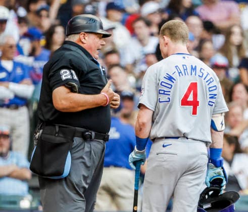 Chicago Cubs center fielder Pete Crow-Armstrong talks with home plate umpire Hunter Wendelstedt after being called out on strikes in the fifth inning of the MLB, Baseball Herren, USA game between the Chicago Cubs and the Milwaukee Brewers at American Family Field in Milwaukee, Wisconsin on Saturday, June 27, 2026.  MIL20260627819 TANNENxMAURY