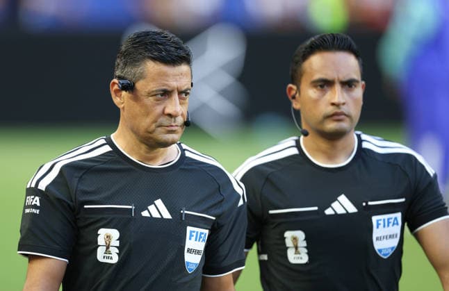 (260628) -- MIAMI, June 28, 2026 -- Referee Alireza Faghani (L) is seen before the group K match between Colombia and Portugal at the 2026 FIFA World Cup, WM, Weltmeisterschaft, Fussball at Miami Stadium, Miami, the United States, June 27, 2026. ) (SP)U.S.-MIAMI-FOOTBALL-FIFA WORLD CUP-GROUP K-COL VS POR XuxZijian 