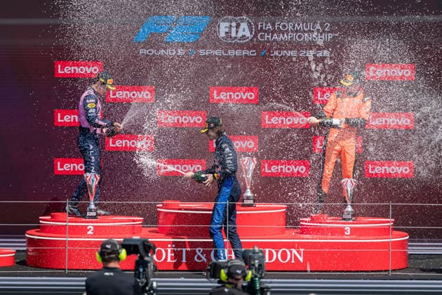 MOTORSPORTS, FORMULA 1 - GP of Austria 2026 SPIELBERG,AUSTRIA,28.JUN.26 - MOTORSPORTS, FORMULA 1 - Grand Prix of Austria, Red Bull Ring, FIA Formula 2. Image shows a Gabriele Mini (ITA MP Motorsport), Nikola Tsolov (BUL Campos Racing) and Oliver Goethe (GER MP Motorsport). Keywords: champagne shower.  GEPAxpictures xMatthiasxTrinkl
