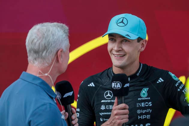 MOTORSPORTS, FORMULA 1 - GP of Austria 2026 SPIELBERG,AUSTRIA,28.JUN.26 - MOTORSPORTS, FORMULA 1 - Grand Prix of Austria, Red Bull Ring. Image shows George Russell (GBR Mercedes) during an interview with David Coulthard.  GEPAxpictures xMatthiasxTrinkl