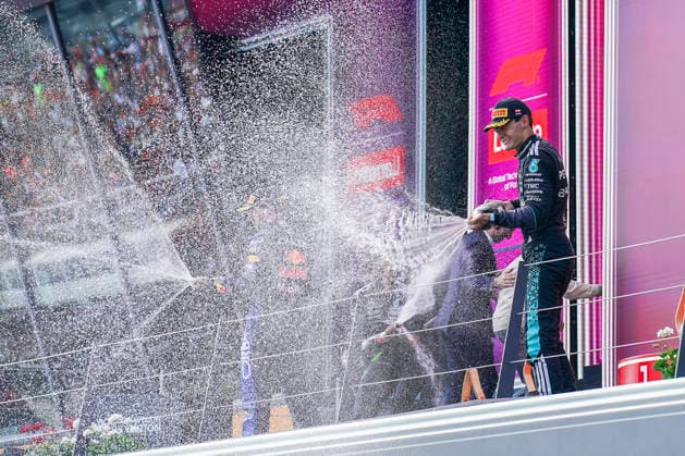 FORMULA ONE AUSTRIAN GRAND PRIX 2026 George Russell 63 (GBR) Mercedes, Max Verstappen 3 (NED) Red Bull Racing and Kimi Antonelli 12 (ITA) Mercedes celebrate on the podium during the Formula 1 Lenovo Austrian Grand Prix 2026, 8th round of the 2026 Formula 1 World Championship, WM, Weltmeisterschaft from 26th-28th June, 2026 at the Red Bull Ring, Spielberg, Austria. Credit: Robbie Hoad Every Second Media Editorial use only. All images are copyright Every Second Media Limited. No images may be reproduced without prior permission. Copyright: xIMAGO EveryxSecondxMediax ESM-2048-0458 RobbiexHoadx xEveryxSecondxMediax