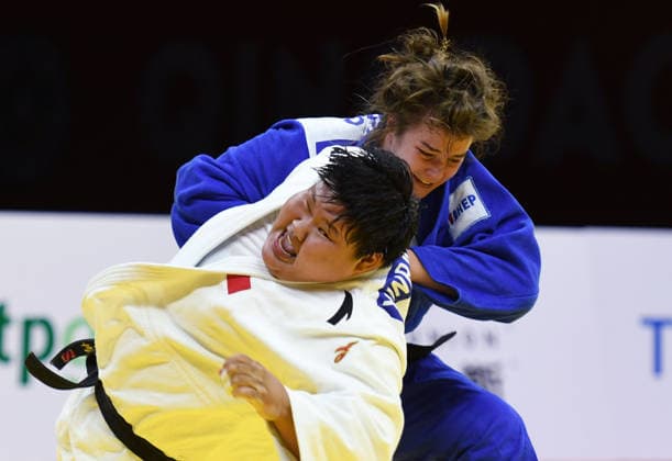 (260628) -- QINGDAO, June 28, 2026 -- Niu Xinran (L) of China competes against Helena Vukovic of Croatia during the women s +78kg bronze medal match at the IJF World Judo Tour Qingdao Grand Prix 2026 in Qingdao, east China s Shandong Province, June 28, 2026. ) (SP)CHINA-QINGDAO-JUDO-GRAND PRIX 2026(CN) LixZiheng 