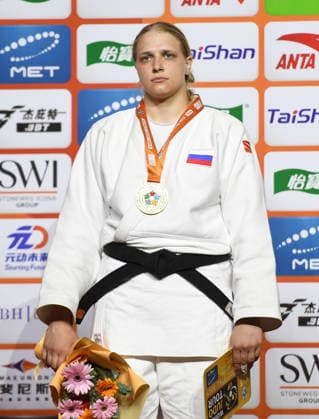 (260628) -- QINGDAO, June 28, 2026 -- Gold medalist Adam Sangariev of Russia poses during the awarding ceremony for the women s +78kg at the IJF World Judo Tour Qingdao Grand Prix 2026 in Qingdao, east China s Shandong Province, June 28, 2026. ) (SP)CHINA-QINGDAO-JUDO-GRAND PRIX 2026(CN) LixZiheng 