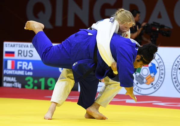 (260628) -- QINGDAO, June 28, 2026 -- Elis Startseva (L) of Russia competes against Lea Fontaine of France during the women s +78kg final match at the IJF World Judo Tour Qingdao Grand Prix 2026 in Qingdao, east China s Shandong Province, June 28, 2026. ) (SP)CHINA-QINGDAO-JUDO-GRAND PRIX 2026(CN) LixZiheng 
