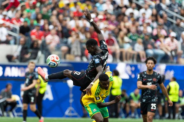 June 28, 2026, Los Angeles, California, USA: CanadaÃ¢â‚¬â ¢s Tani Oluwaseyi (12) and South Africa s Teboho Mokoena (4) vie for the ball during the FIFA World Cup, WM, Weltmeisterschaft, Fussball Round of 32 soccer match at SoFi Stadium in Inglewood, Calif., Sunday, June 28, 2026. World Cup 2026: Canada Vs South Africa  - ZUMAc68_ 20260628_zaf_c68_034 Copyright: xRingoxChiux