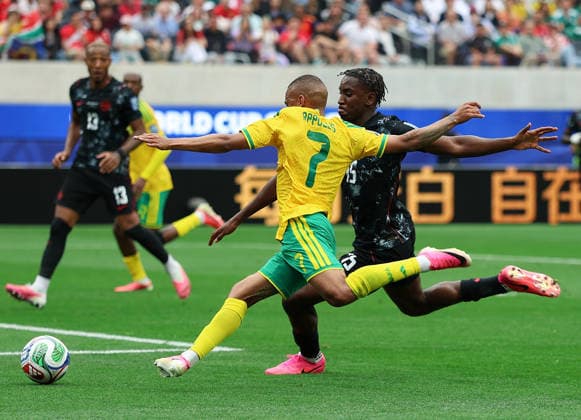 (260629) -- LOS ANGELES, June 29, 2026 -- Oswin Appollis (L) of South Africa competes with Moise Bombito of Canada during the round of 32 match between Canada and South Africa at the 2026 FIFA World Cup, WM, Weltmeisterschaft, Fussball at Los Angeles Stadium in Los Angeles, the United States, June 28, 2026. ) (SP)U.S.-LOS ANGELES-FOOTBALL-FIFA WORLD CUP-ROUND OF 32-CAN VS RSA BaixXuefei 