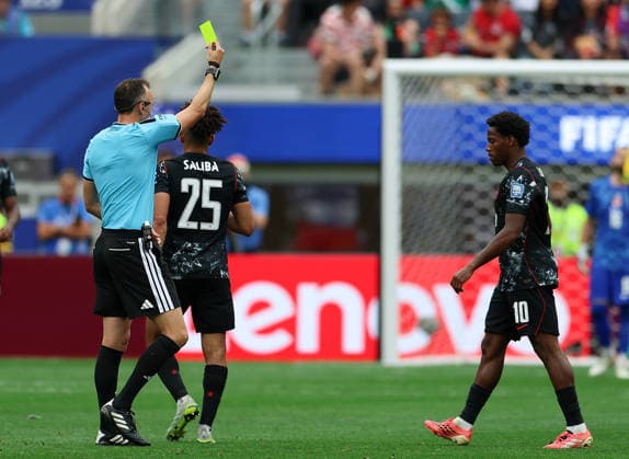 (260629) -- LOS ANGELES, June 29, 2026 -- Referee Joao Pinheiro shows a yellow card to Nathan Saliba (C) of Canada during the round of 32 match between Canada and South Africa at the 2026 FIFA World Cup, WM, Weltmeisterschaft, Fussball at Los Angeles Stadium in Los Angeles, the United States, June 28, 2026. ) (SP)U.S.-LOS ANGELES-FOOTBALL-FIFA WORLD CUP-ROUND OF 32-CAN VS RSA BaixXuefei 