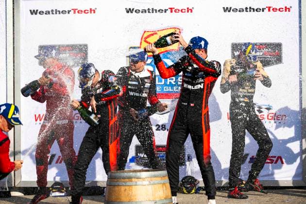 AUTO - 6 HOURS OF THE GLEN 2026 31 AITKEN Jack (gbr), BAMBER Earl (nzl), VESTI Frederik (dnk), Cadillac Whelen, Cadillac V-Series.R, podium during the Six Hours of the Glen 2026, 6th round of the 2026 IMSA WeatherTech SportsCar Championship, from June 26 to 28 on the Watkins Glen International in Watkins Glen, New York, United States of America - Watkins GlenUnited States  Copyright: xFabrizioxBoldonix