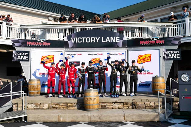 AUTO - 6 HOURS OF THE GLEN 2026 93 OHTA Kaku (jpn) YELLOLY Nick (gbr), VAN DER ZANDE Renger (nld), Acura Meyer Shank Racing with Curb-Agajanian, Acura ARX-06, 31 AITKEN Jack (gbr), BAMBER Earl (nzl), VESTI Frederik (dnk), Cadillac Whelen, Cadillac V-Series.R, 05 VAN DER HELM Tijmen (nld), HENIRICH Laurin (deu), KAYLEN Frederick (usa), JDC-Miler MotorSports, Porsche 963, podium during the Six Hours of the Glen 2026, 6th round of the 2026 IMSA WeatherTech SportsCar Championship, from June 26 to 28 on the Watkins Glen International in Watkins Glen, New York, United States of America - Watkins GlenUnited States  Copyright: xFabrizioxBoldonix
