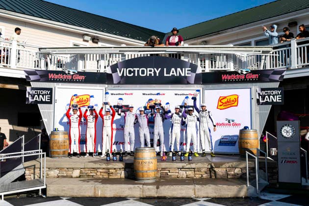 AUTO - 6 HOURS OF THE GLEN 2026 04 KURTZ George (usa), QUINN Alex (gbr), SOWERY Toby (gbr), CrowdStrike Racing by APR, Oreca 07-Gibson, 99 CAMERON Dane (usa), EDGAR Jonny (gbr), HYETT P. J. (usa), AO Racing, Oreca 07-Gibson, 18 ABEL Jacob (usa), HABSBURG Ferdinand (aut), RAO Naveen (usa), Era Motorsport, Oreca 07-Gibson, podium during the Six Hours of the Glen 2026, 6th round of the 2026 IMSA WeatherTech SportsCar Championship, from June 26 to 28 on the Watkins Glen International in Watkins Glen, New York, United States of America - Watkins GlenUnited States  Copyright: xFabrizioxBoldonix