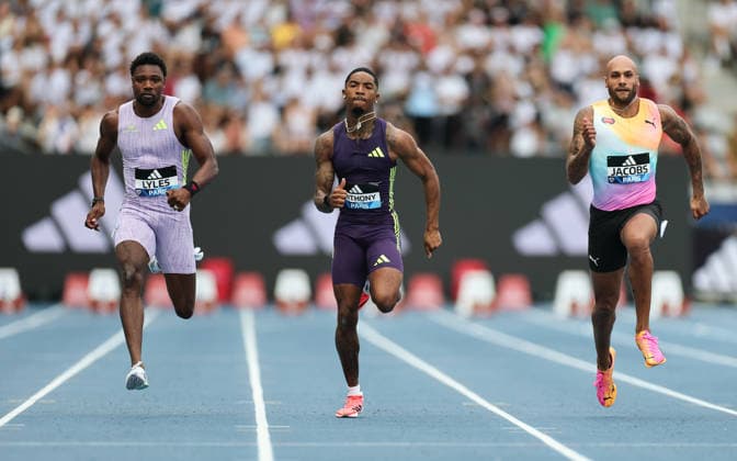 (260629) -- PARIS, June 29, 2026 -- Noah Lyles (L) of the United States, Jordan Anthony (C) of the United States and Lamont Marcell Jacobs of Italy compete during the men s 100m final at the 2026 World Athletics Diamond League in Paris, France, June 28, 2026. ) (SP)FRANCE-PARIS-ATHLETICS-DIAMOND LEAGUE 2026 WuxHuiwo 