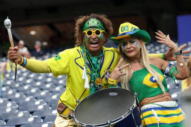 HOUSTON, TX - JUNE 29: Two Brazil fans are dressed in team colors and are ready to drum before the FIFA World Cup, WM, Weltmeisterschaft, Fussball 2026 Round of 32 match between Brazil and Japan on June 29, 2026, at Houston Stadium in Houston, Texas. (Photo by David Buono Icon Sportswire) SOCCER: JUN 29 FIFA World Cup 26 Round of 32 - Brazil vs Japan EDITORIAL USE ONLY Icon260629003