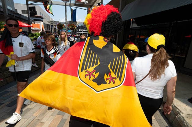 June 29, 2026; Foxborough, Massachusetts, USA; A Germany supporter walks through the crowd at Patriot Place ahead of a FIFA World Cup, WM, Weltmeisterschaft, Fussball 2026 Round of 32 match between Germany and Paraguay at Boston Stadium. (c) CSM - ZUMAc04_ 20260629_zma_c04_002 Copyright: xBurtxGranofskyx