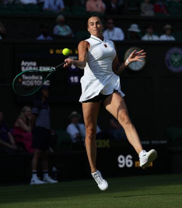 Aryna Sabalenka plays a forehand in her match against Serbian Teodora Kostovic on day one of the 2026 Wimbledon Championships in London on Monday, June 29, 2026.  LON2026062938 HUGOxPHILPOTT