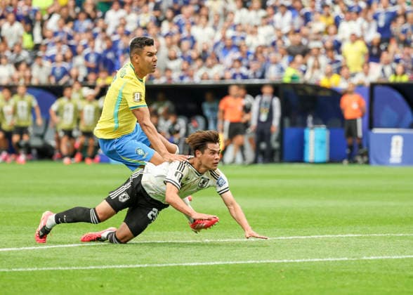HOUSTON, TX - JUNE 29: (left to right) Casemiro 5 of Brazil and Kaishu Sano 24 of Japan watch the ball go into the goal in the first half during the FIFA World Cup, WM, Weltmeisterschaft, Fussball 2026 Round of 32 match between Brazil and Japan on June 29, 2026 at Houston Stadium in Houston, Texas. (Photo by Leslie Plaza Johnson Icon Sportswire) SOCCER: JUN 29 FIFA World Cup 26 Round of 32 - Brazil v Japan EDITORIAL USE ONLY Icon260629010