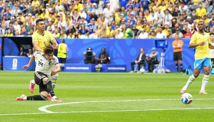 Football: 2026 World Cup Japan s Kaishu Sano (front, L) scores the opening goal in the first half of a World Cup round of 32 football match against Brazil at Houston Stadium in Houston on June 29, 2026.  A14AA0005620712P