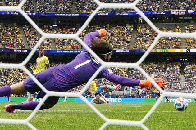Football: 2026 World Cup Japan s Kaishu Sano (C, bottom) scores the opening goal in the first half of a World Cup round of 32 football match against Brazil at Houston Stadium in Houston on June 29, 2026.  A14AA0005620724P