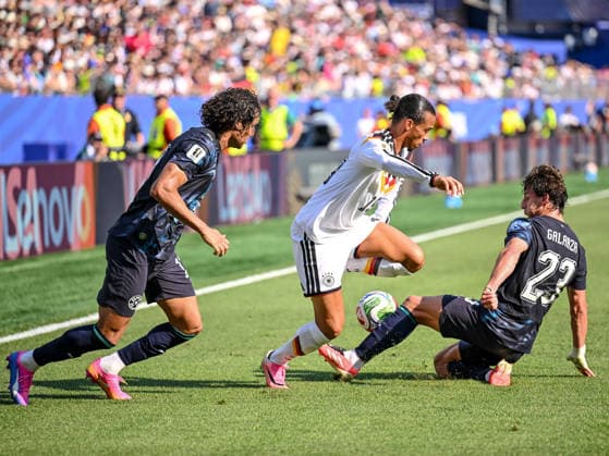 Jose Canale (Paraguay), Leroy Sane (Germany) and Matias Galarza (Paraguay) battle for the ball during the FIFA World Cup, WM, Weltmeisterschaft, Fussball 2026 Round Of 32 match between Germany and Paraguay at Boston Stadium on June 29, 2026 in Foxborough, United States. (Photo by Harry Langer DeFodi Images) - *** Jose Canale of Paraguay, Leroy Sane of Germany, and Matias Galarza of Paraguay battle for the ball during the 2026 FIFA World Cup Round of 32 match between Germany and Paraguay at Boston Stadium on June 29, 2026, in Foxborough, United States. Photo by Harry Langer, DeFodi Images