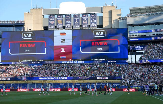 (260630) -- BOSTON, June 30, 2026 -- The screen of the stadium shows a VAR review message to check a goal scored by Germany s Jonathan Tah during the round of 32 match between Germany and Paraguay at the 2026 FIFA World Cup, WM, Weltmeisterschaft, Fussball at Boston Stadium in Boston, the United States, June 29, 2026. ) (SP)U.S.-BOSTON-FOOTBALL-FIFA WORLD CUP-ROUND OF 32-GER VS PRY ChenxYichen 