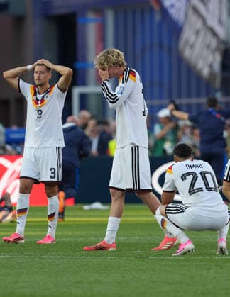 (260630) -- BOSTON, June 30, 2026 -- Members of team Germany react after losing the round of 32 match between Germany and Paraguay at the 2026 FIFA World Cup, WM, Weltmeisterschaft, Fussball at Boston Stadium in Boston, the United States, June 29, 2026. ) (SP)U.S.-BOSTON-FOOTBALL-FIFA WORLD CUP-ROUND OF 32-GER VS PRY HuangxZongzhi 