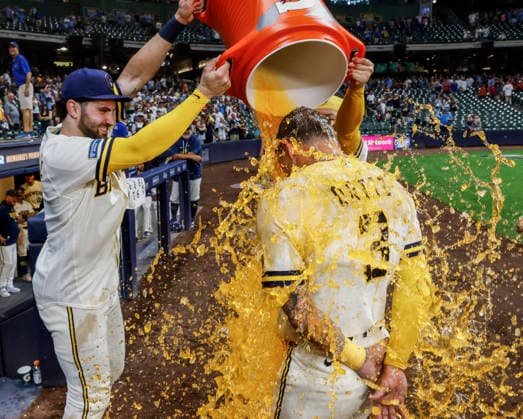 Milwaukee Brewers third baseman Joey Ortiz gets a Gatorade bath for hitting the game winning home after the MLB, Baseball Herren, USA game between the Cincinnati Reds and the Milwaukee Brewers at American Family Field in Milwaukee, Wisconsin on Monday, June 29, 2026. The Brewers defeated the Reds 5-3.  MIL20260629850 TANNENxMAURY