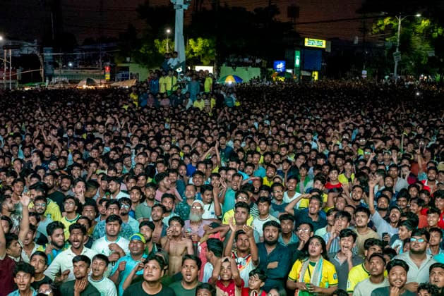 Bangladesh: Football Fans In Chattogram Watch FIFA World Cup, WM, Weltmeisterschaft, Fussball 2026 Match Brazil Vs Japan A large crowd of football fans gathers at Kazir Dewri and 2 No. Gate intersections in Chattogram, Bangladesh, at midnight on June 30, 2026, to watch the live telecast of the FIFA World Cup match between Brazil and Japan on giant screens. The gathering creates a vibrant street festival atmosphere as supporters cheer for their favorite team. Chattogram Bangladesh  Copyright: xZakirxHossainx originalFilename:hossain-notitle260629_np4OR.jpg