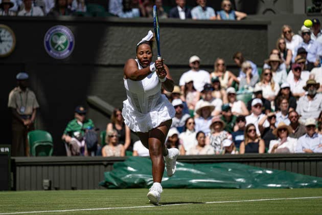 RECORD DATE NOT STATED 30th June 2026; All England Lawn Tennis and Croquet Club, London, England; Wimbledon Tennis Tournament, Day Two; Taylor Townsend (USA) plays a backhand in her first round match against Iga Swiatek (POL) GodfreyxPitt