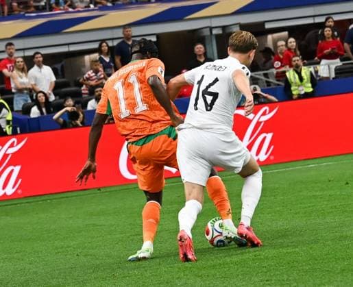Cote D Ivoire v Norway Round Of 32 - FIFA World Cup, WM, Weltmeisterschaft, Fussball 2026 DALLAS, TEXAS, UNITED STATES JUNE 30, 2026: CÃ te d Ivoire forward Yan DiomandÃ ( 11) and Norway defender Marcus Holmgren Pedersen ( 16) challenge for the ball during the FIFA World Cup Round of 16 match at Dallas Stadium in Dallas, Texas, USA, on June 30, 2026. DALLAS United States of America Copyright: x xwalidxibrahimx xJNAxPressx