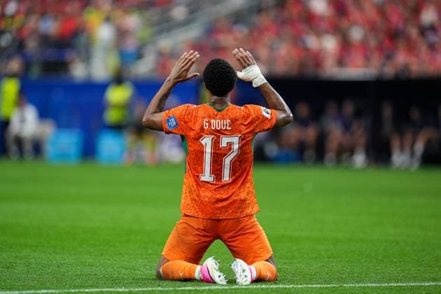 GuÃ la DouÃ of the Ivory Coast on his knees after Amad Diallo of the Ivory Coast goal Ivory Coast v Norway, 2026 FIFA World Cup, WM, Weltmeisterschaft, Fussball Round of 32, Football, Dallas Stadium, Arlington, Texas, USA - 30 Jun 2026Arlington Dallas Stadium Texas (TX) United States of America  Copyright: xIsmaelxAdnan Shutterstockx 16970308cp