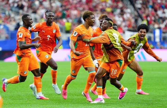 (260701) -- DALLAS, July 1, 2026 -- Amad Diallo (3rd L) of Cote d Ivoire celebrates with teammates after scoring during the round of 32 match between Cote d Ivoire and Norway at the 2026 FIFA World Cup, WM, Weltmeisterschaft, Fussball at Dallas Stadium in Dallas, the United States, June 30, 2026. ) (SP)U.S.-DALLAS-FOOTBALL-FIFA WORLD CUP-ROUND OF 32-CIV VS NOR JiaxHaocheng 