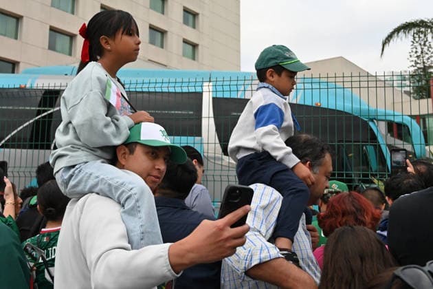 Iranian national team, Nationalteam FIFA World Cup, WM, Weltmeisterschaft, Fussball 2026 leave Tijuana, Mexico camp back home to Iran TIJUANA, MEXICO - JUNE 30: A young fan carries a flag of Iran on top of her father’s shoulders as they wait for the Iranian National Team to leave the Marriott Hotel at their Tijuana base camp to the airport ahead of the players departure following its elimination from the 2026 World Cup football tournament in Tijuana, Mexico on Tuesday, June 30, 2026. Carlos A. Moreno Anadolu Tijuana Mexico. Editorial use only. Please get in touch for any other usage.  Copyright: x2026xAnadoluxCarlosxA.xMorenox