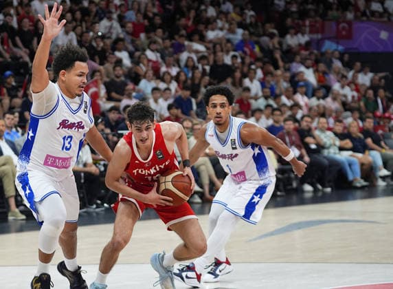 Turkiye v Puerto Rico - FIBA U17, U 17 Basketball World Cup ISTANBUL, TURKIYE - JUNE 30: Omer Kutluay of Turkiye competes with Yaddiel Sanchez (13) of Puerto Rico during the FIBA U17 Basketball World Cup group phase match between Puerto Rico and Turkiye at the Basketball Development Center in Istanbul, Turkiye on June 30, 2026. Esra Bilgin Anadolu Istanbul Turkey. Editorial use only. Please get in touch for any other usage.  Copyright: x2026xAnadoluxEsraxBilginx