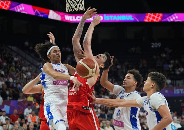 Turkiye v Puerto Rico - FIBA U17, U 17 Basketball World Cup ISTANBUL, TURKIYE - JUNE 30: Darius Karutasu of Turkiye competes with Luis Rosado of Puerto Rico during the FIBA U17 Basketball World Cup group phase match between Puerto Rico and Turkiye at the Basketball Development Center in Istanbul, Turkiye on June 30, 2026. Esra Bilgin Anadolu Istanbul Turkey. Editorial use only. Please get in touch for any other usage.  Copyright: x2026xAnadoluxEsraxBilginx