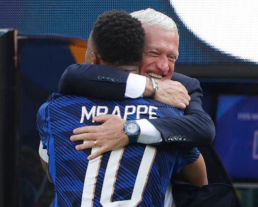 Kylian Mbappe of France celebrates with head coach Didier Deschamps after scoring a goal against Sweden in the first half during a Round of 32 FIFA World Cup, WM, Weltmeisterschaft, Fussball match at New York New Jersey Stadium in East Rutherford, New Jersey, on Tuesday, June 30, 2026.  NYP20260630917 JOHNxANGELILLO
