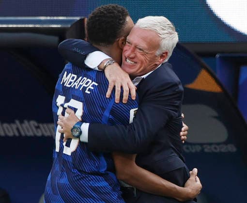 Kylian Mbappe of France celebrates with head coach Didier Deschamps after scoring a goal against Sweden in the first half during a Round of 32 FIFA World Cup, WM, Weltmeisterschaft, Fussball match at New York New Jersey Stadium in East Rutherford, New Jersey, on Tuesday, June 30, 2026.  NYP20260630918 JOHNxANGELILLO